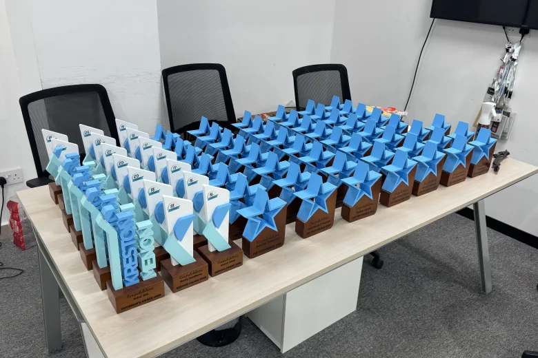 A production run of identical parts, batch-printed and finished — Orbit3D, UAE